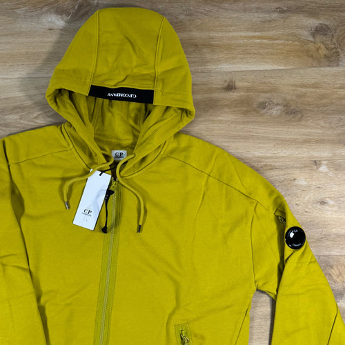 C.P. Company Diagonal Raised Zipped Lens Hoodie in Antique Moss - Yellow